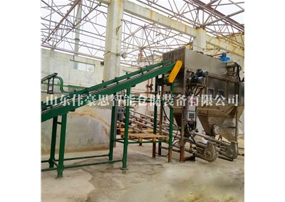 袋裝石英粉自動破包機助力企業(yè)發(fā)展