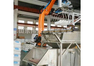 簡述石灰自動拆包機(jī)械手的使用優(yōu)勢